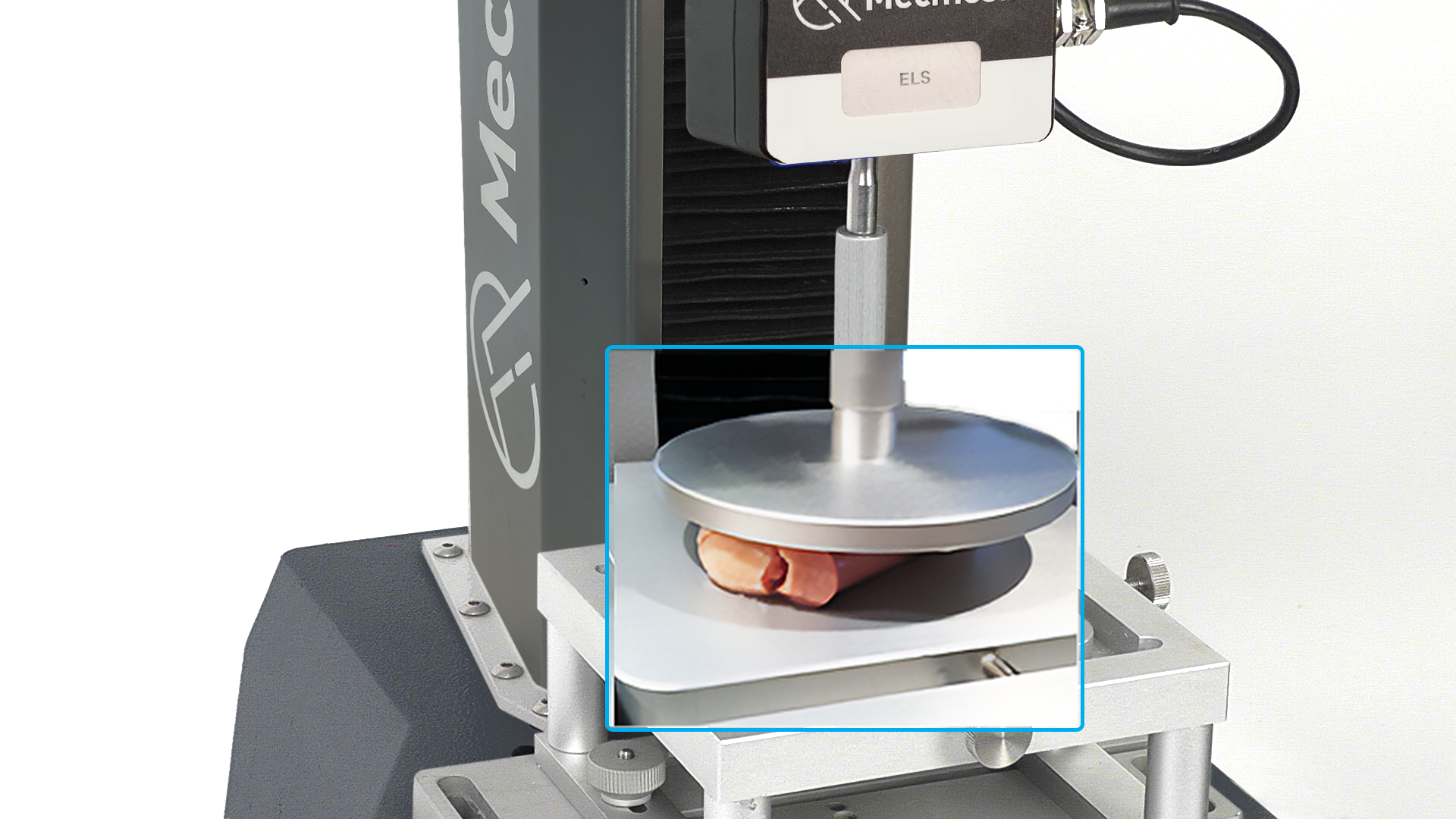 Tofu hotdog sausage undergoing full compression to calculate mouthfeel texture of the second chew